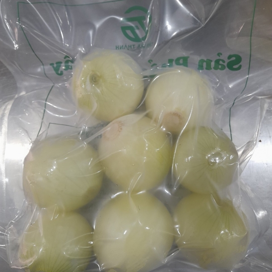 Frozen peeled yellow onion