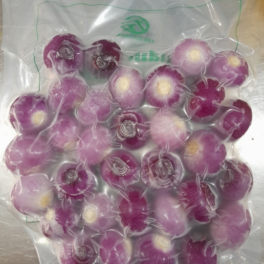 Frozen peeled red onion